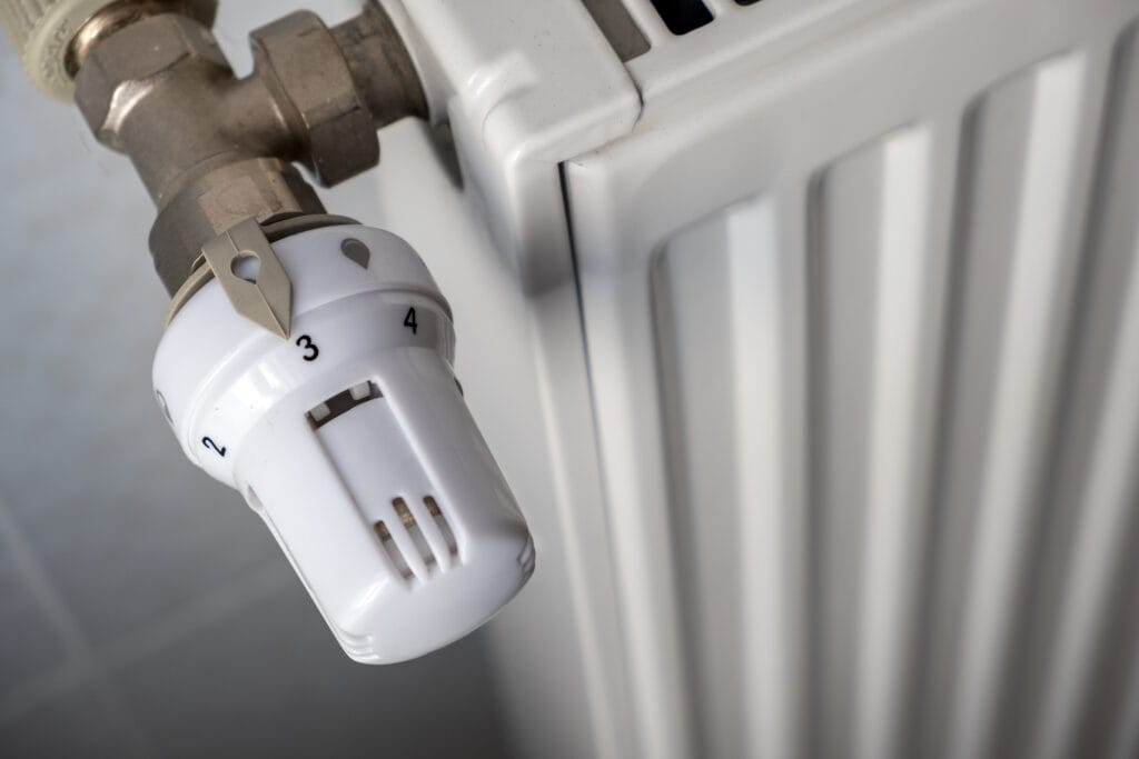 Closeup of heating radiator valve for comfortable temperature regulation